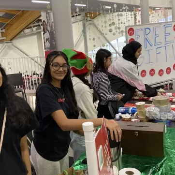 Naqeeyah volunteering at Shane Homes YMCA at Rocky Ridge 