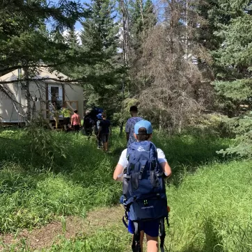 Max entering his Yurt with his group on the first day of Camp